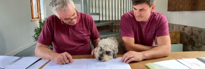 Matthew Burt and team reviewing drawings